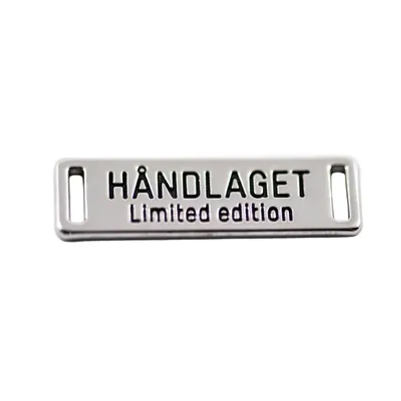 Håndlaget Merke metall 